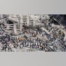Rescue workers sift through the wreckage of the World Trade Center Sept. 13, 2001 in New York City, two days after two hijacked airplanes slammed into the twin towers, levelling them in an alleged terrorist attack.