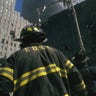 A New York firefighter amid the rubble of the World Trade Center following the 9/11 attacks. 