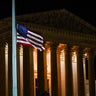 The American flag blows in the wind after it was lowered to half-staff Friday, Sept. 18, 2020, in Washington, after the Supreme Court announced that Supreme Court Justice Ruth Bader Ginsburg has died of metastatic pancreatic cancer at age 87. (AP Photo/Alex Brandon)