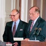 FILE - In this Aug. 10, 1993, file photo, Supreme Court Justice Ruth Bader Ginsburg takes the court oath from Chief Justice William Rehnquist, right, during a ceremony in the East Room of the White House in Washington. Ginsburg's husband Martin holds the Bible and President Bill Clinton watches at left. The Supreme Court says Ginsburg has died of metastatic pancreatic cancer at age 87. (AP Photo/Marcy Nighswander, File)