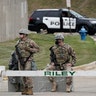 Members of the National Guard secure Mary D. Bradford High School.