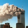 Smoke pours from the twin towers of the World Trade Center after they were hit by two hijacked airliners in a terrorist attack Sept. 11, 2001 in New York City.