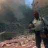 A New York rescuer worker amid the rubble of the World Trade Center following the 9/11 attacks. 