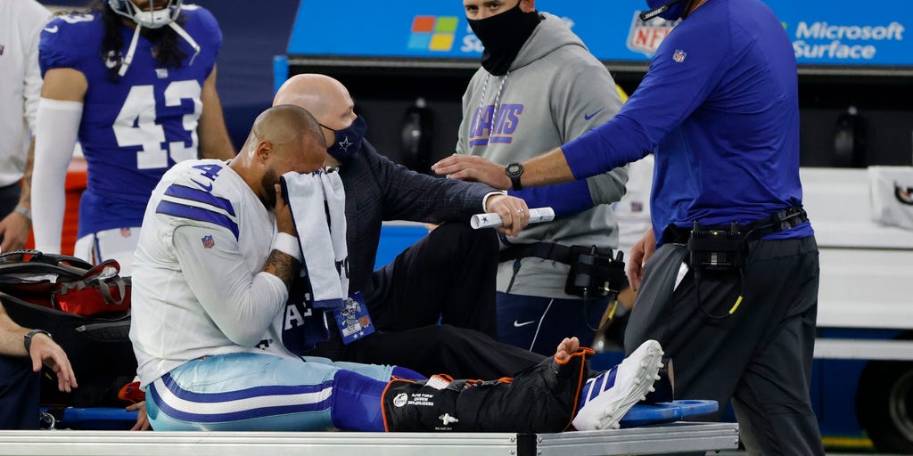 Top photos from Cowboys-Giants: Teary-eyed Dak Prescott carted off, players  support their star QB after gruesome injury