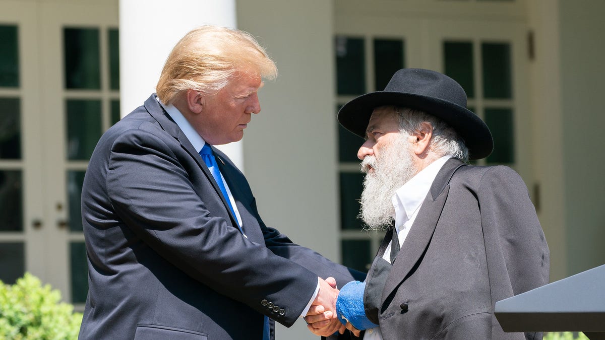 President Donald J. Trump listens to Rabbi Yisroel Goldstein of the Chabad of Poway, California, at the National Day of Prayer Service in the Rose Garden, May 2, 2019. (Official White House photo by Tia Dufour)