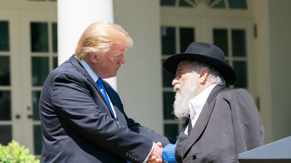 President Donald J. Trump listens to Rabbi Yisroel Goldstein of the Chabad of Poway, California, at the National Day of Prayer Service in the Rose Garden, May 2, 2019. (Official White House photo by Tia Dufour)