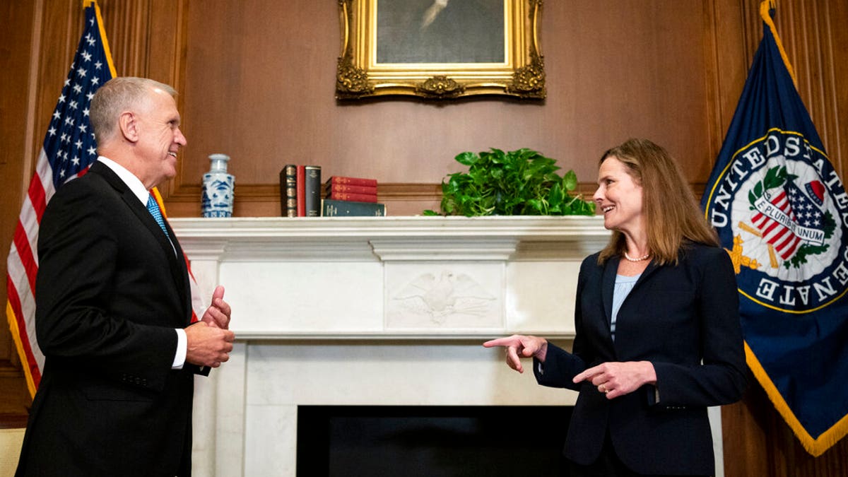 Sen. Thom Tillis, R-N.C., meets with Judge Amy Coney Barrett, President Donald Trump's nominee to the Supreme Court, at the U.S. Capitol, Sept. 30, 2020, in Washington. (Associated Press)
