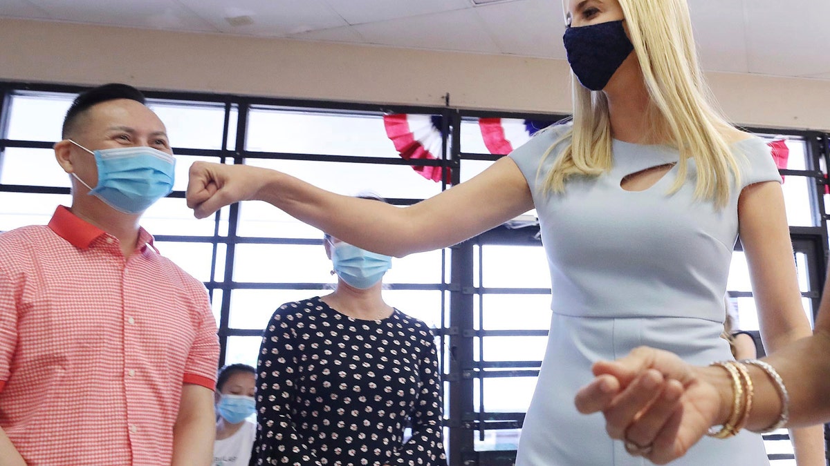 Ivanka Trump greets Trump 2020 supporters at the Asian Pacific Americans for Trump volunteer center in Orlando, Fla., on Wednesday, Sept. 30, 2020. (Stephen M. Dowell/Orlando Sentinel via AP)