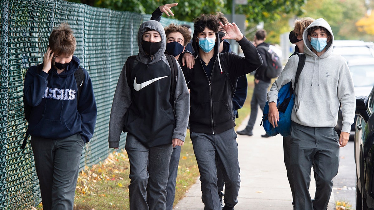 Students from Lasalle Community Comprehensive High School walk out of class to protest COVID-19 safety concerns Thursday, Oct. 1, 2020 in Montreal. (Ryan Remiorz/The Canadian Press via AP)