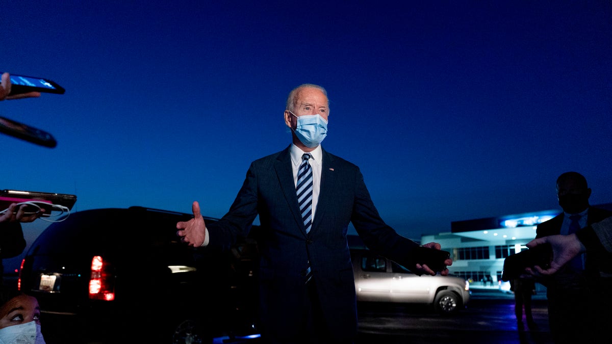 Democratic presidential candidate former Vice President Joe Biden speaks to members of the media before boarding his campaign plane at Hagerstown Regional Airport in Hagerstown, Md., Tuesday, Oct. 6, 2020, to travel home to Wilmington, Del. after visiting Gettysburg, Pa. (AP Photo/Andrew Harnik)