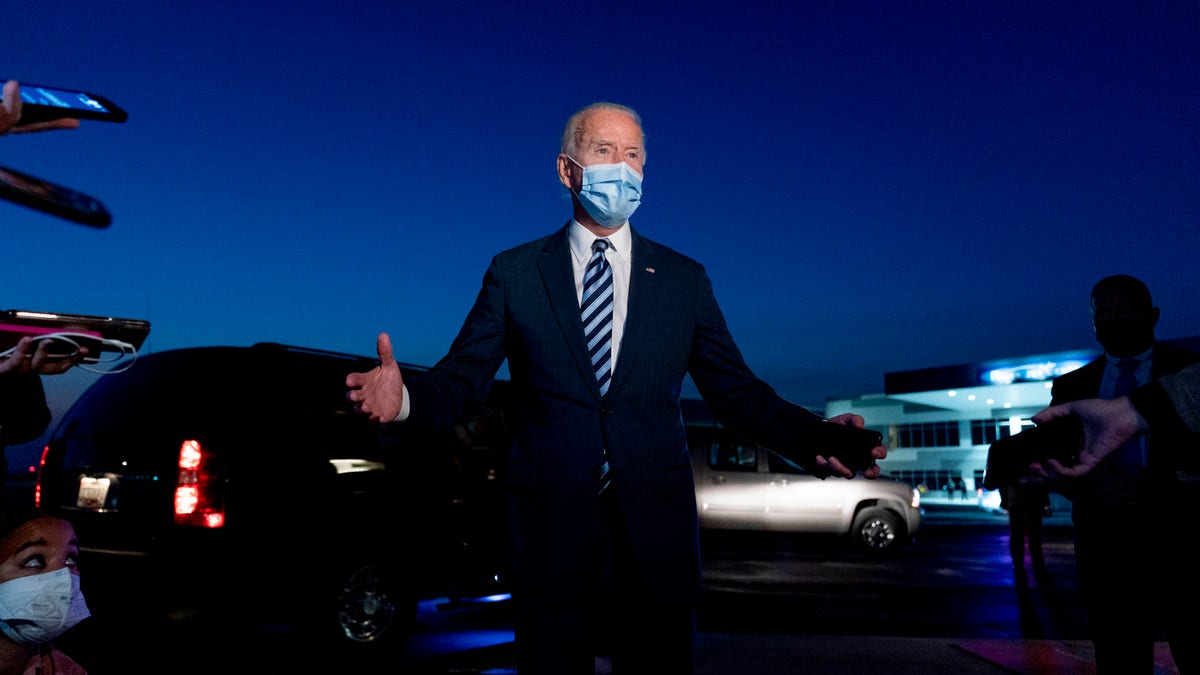 Democratic presidential candidate former Vice President Joe Biden speaks to members of the media before boarding his campaign plane at Hagerstown Regional Airport in Hagerstown, Md., Tuesday, Oct. 6, 2020, to travel home to Wilmington, Del. after visiting Gettysburg, Pa. (AP Photo/Andrew Harnik)