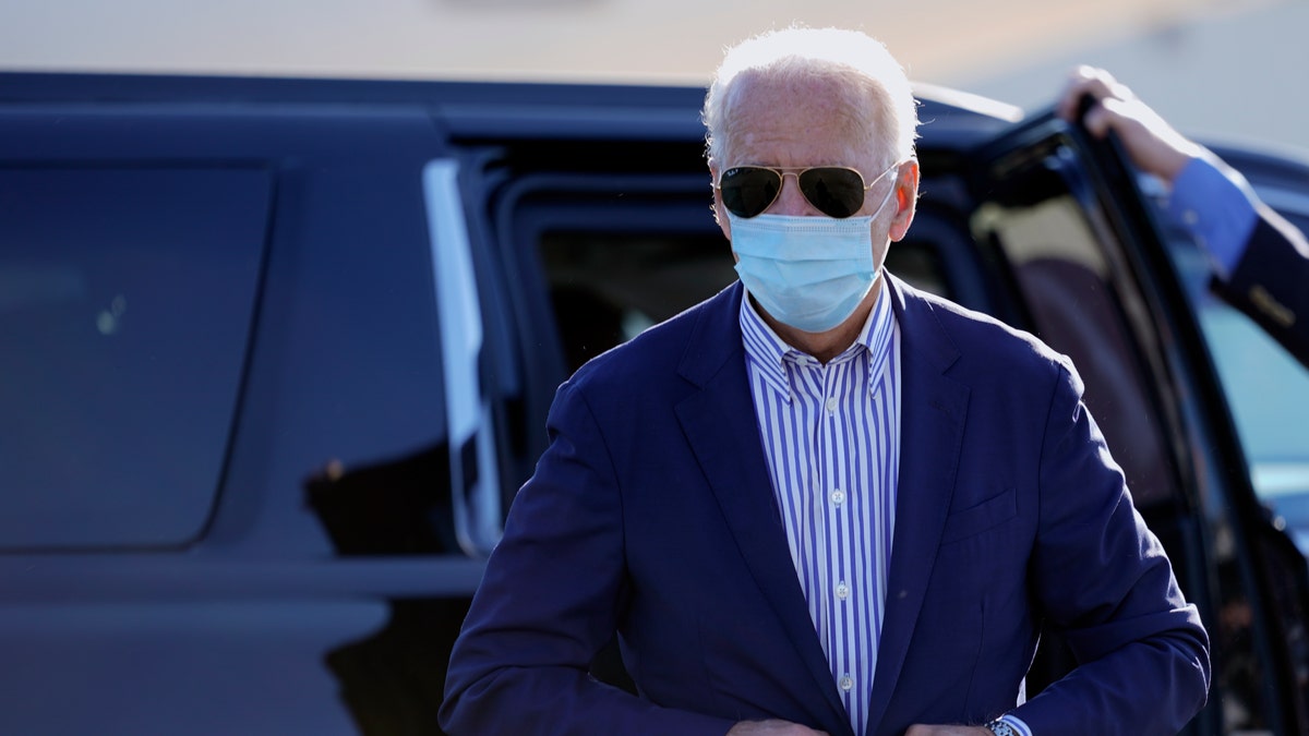 Democratic presidential candidate former Vice President Joe Biden walks to board his campaign plane at New Castle Airport in New Castle, Del., Thursday, Oct. 8, 2020., en route to Arizona. (AP Photo/Carolyn Kaster)