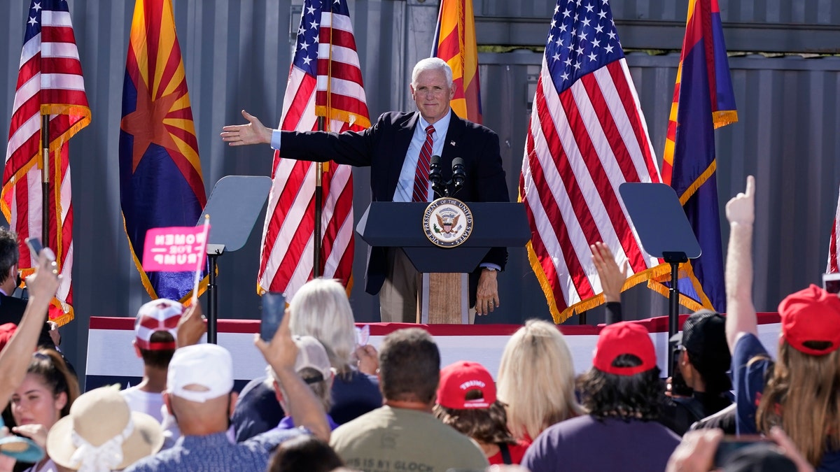 Vice President Mike Pence at a campaign rally at TYR Tactical Thursday, Oct. 8, 2020, in Peoria, Ariz. (AP Photo/Ross D. Franklin)