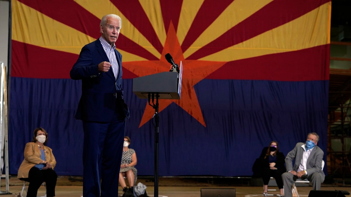 Democratic presidential candidate former Vice President Joe Biden speaks at the Carpenters Local Union 1912 in Phoenix, Thursday, Oct. 8, 2020, to kick off a small business bus tour. (AP Photo/Carolyn Kaster)