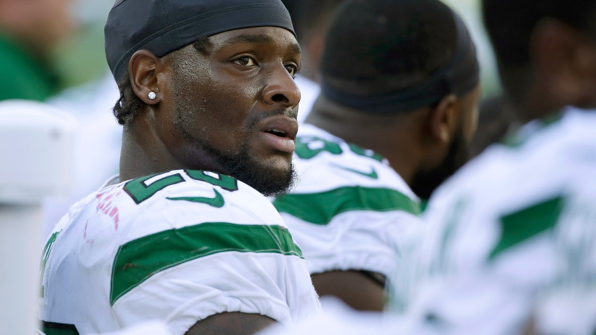 This Sept. 22, 2020, file photo shows former New York Jets running back Le'Veon Bell watching from the sideline near the end of the second half of an NFL football game against the New England Patriots, in Foxborough, Mass. (AP Photo/Steven Senne, File)