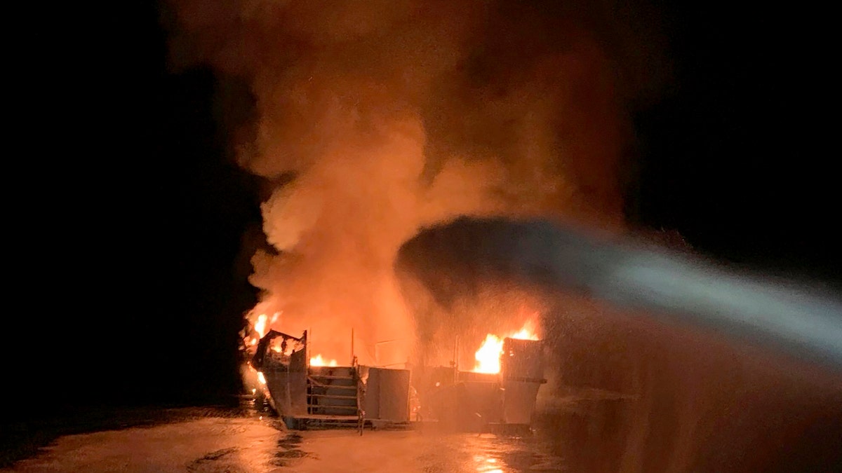 In this Sept. 2, 2019, file photo provided by the Ventura County Fire Department, VCFD firefighters respond to a fire aboard the Conception dive boat fire in the Santa Barbara Channel off the coast of Southern California. (Ventura County Fire Department via AP)