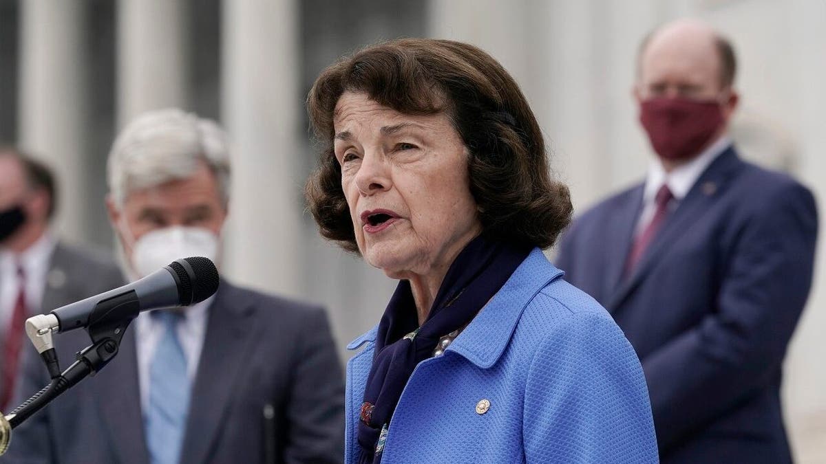 Senate Judiciary Committee ranking member Sen. Dianne Feinstein, D-Calif., speaks during a news conference after boycotting the vote by the Republican-led panel to advance the nomination of Judge Amy Coney Barrett to sit on the Supreme Court, Thursday, Oct. 22, 2020, at the Capitol in Washington, as other Democratic committee members look on. (AP Photo/J. Scott Applewhite)