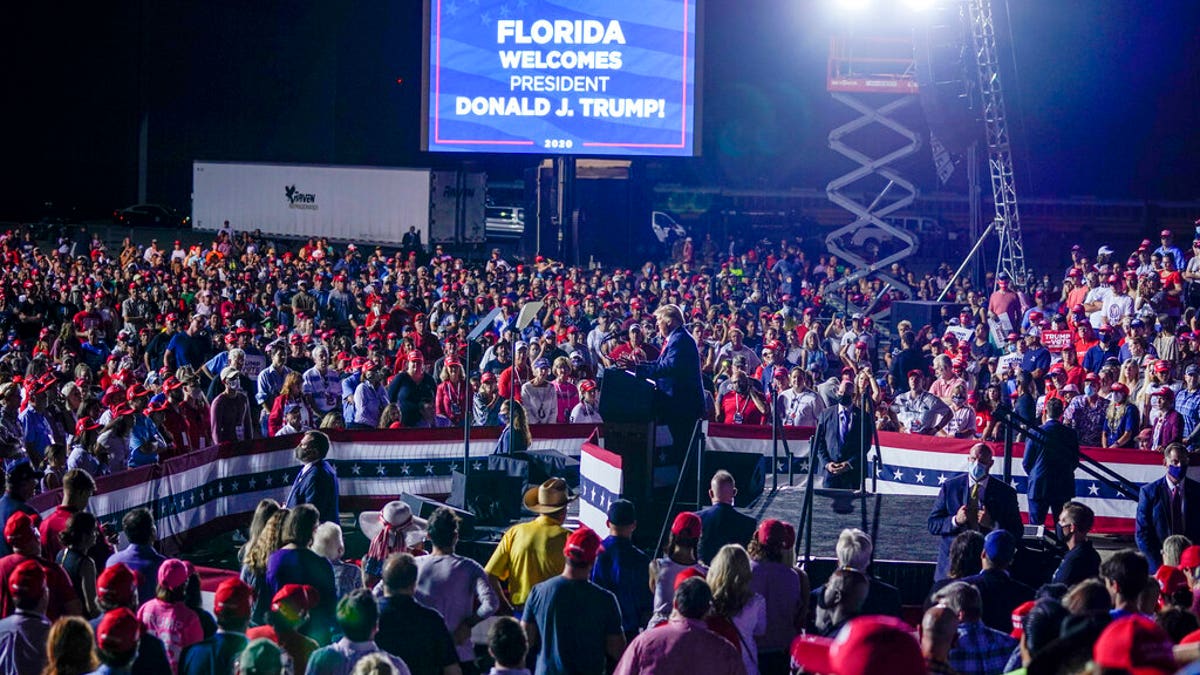 President Donald Trump speaks during a campaign rally at Pensacola International Airport, Friday, Oct. 23, 2020, in Pensacola, Fla. (AP Photo/Evan Vucci)