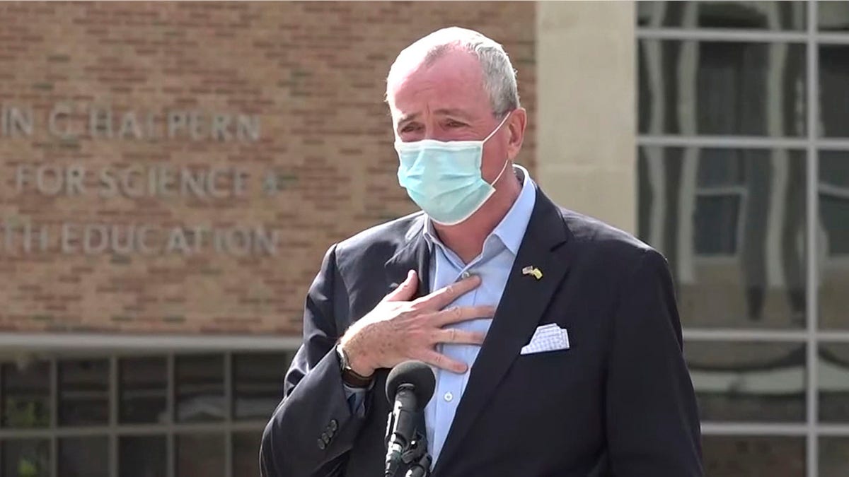 Gov. Phil Murphy tells attendees at an event in Blackwood, N.J., that he must leave the event to quarantine after just finding out that he'd been in contact with someone who had tested positive for COVID-19. Oct. 21, 2020. (New Jersey Office of the Governor via AP, File)
