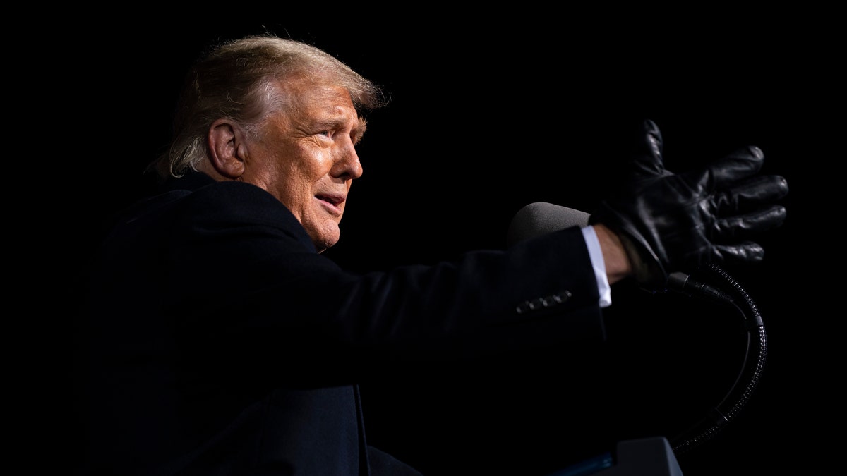 President Donald Trump speaks during a campaign rally at Eppley Airfield, Tuesday, Oct. 27, 2020, in Omaha, Neb. Trump also campaigned in Wisconsin Tuesday, where he accused Joe Biden of standing "with the rioters." (AP Photo/Evan Vucci)