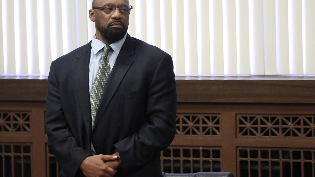 Shomari Legghette listens as the jury finds him guilty of first-degree murder in the 2018 killing of Chicago Police Cmdr. Paul Bauer, at the Leighton Criminal Courthouse in Chicago on March 13, 2020. (Associated Press)