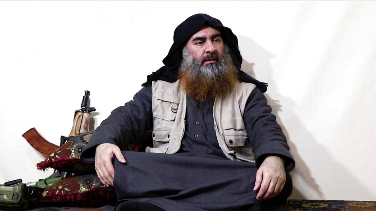 This file image made from video posted on a militant website April 29, 2019, purports to show the leader of the Islamic State group, Abu Bakr al-Baghdadi, being interviewed by his group's Al-Furqan media outlet. (Al-Furqan media via AP)