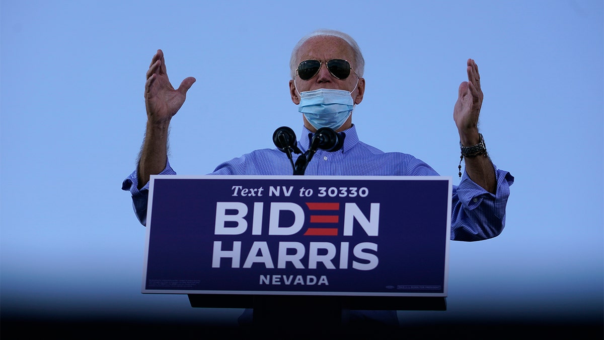 Democratic presidential candidate former Vice President Joe Biden speaks at a Las Vegas Drive-In campaign event at Southeast Career Technical Academy , Friday, Oct. 9, 2020, in Las Vegas. (AP Photo/Carolyn Kaster)