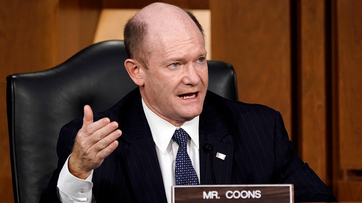 Sen. Chris Coons, D-Del., speaks as the Senate Judiciary Committee hears from legal experts on the final day of the confirmation hearing for Supreme Court nominee Amy Coney Barrett, on Capitol Hill in Washington, Thursday, Oct. 15, 2020. Coons has softened his support for the legislative filibuster in recent years after leading an effort to protect it in 2017. (AP Photo/J. Scott Applewhite)