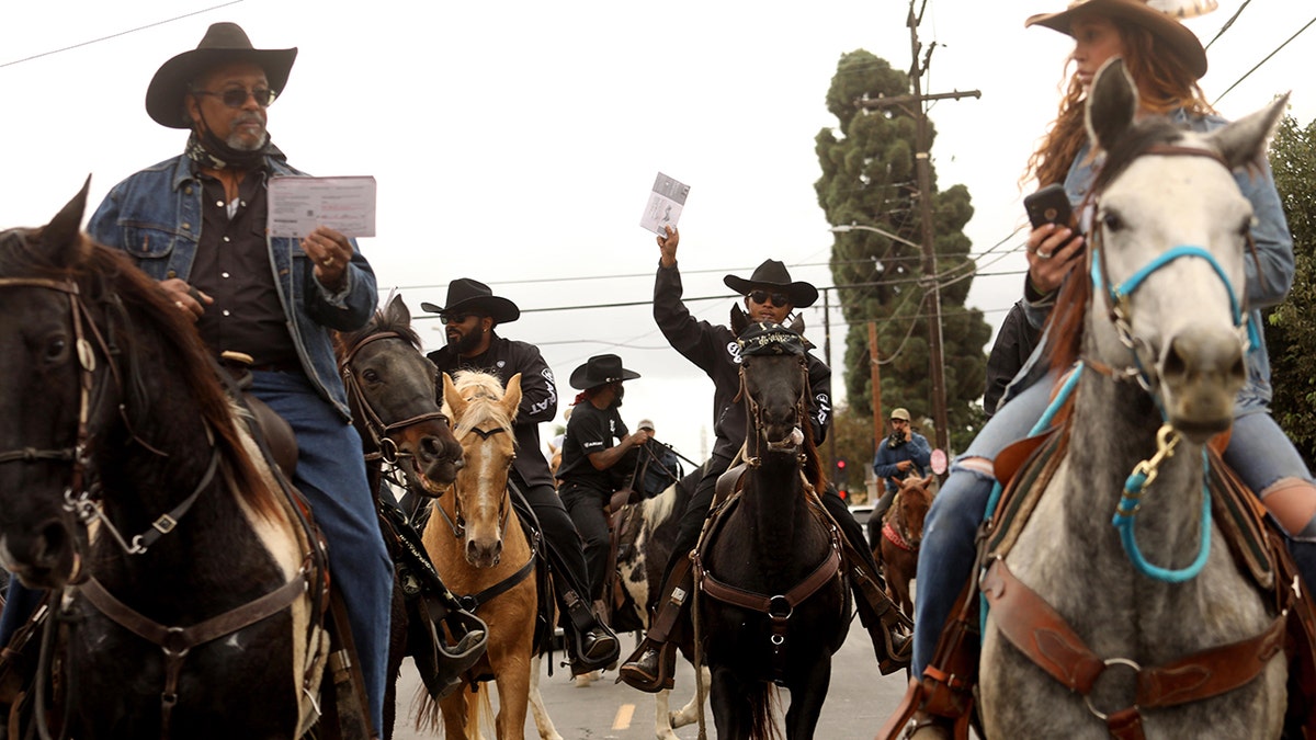 Cowboys on horses