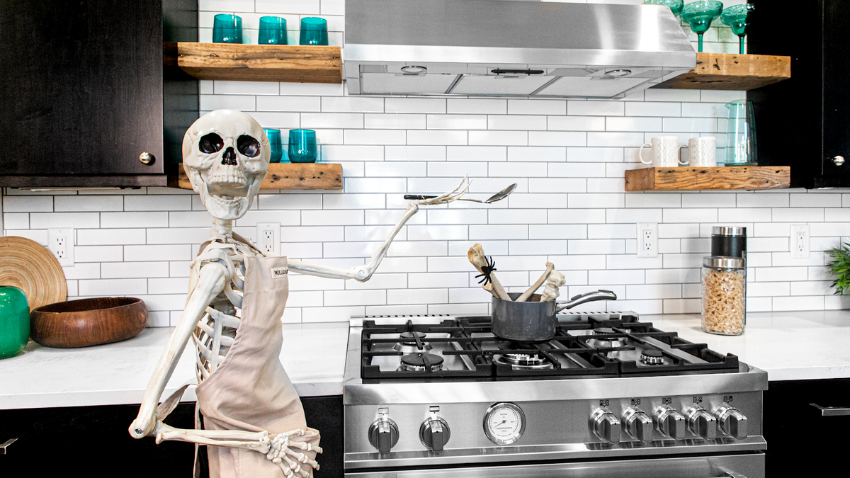 A real estate agent with a funny bone is celebrating the spooky season by decorating homes with skeleton décor.