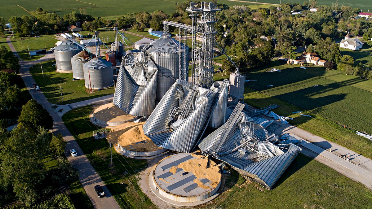 In this aerial image from a drone, damaged grain bins are shown at the Heartland Co-Op grain elevator on August 11, 2020 in Luther, Iowa.