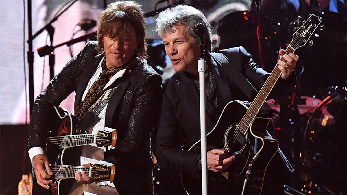 Jon Bon Jovi (R) and Richie Sambora (L) of Bon Jovi