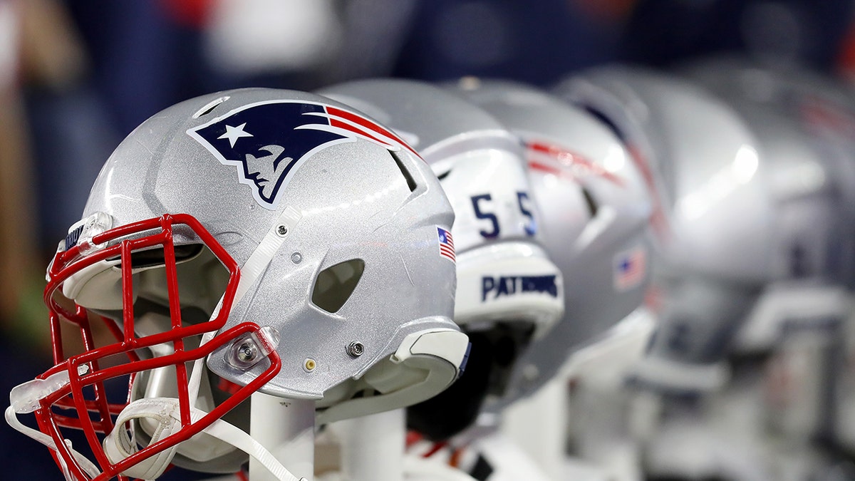 New England Patriots helmets on the sideline