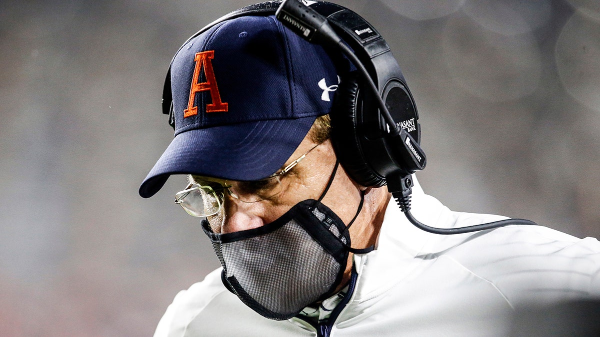 Auburn coach Gus Malzahn walks the sideline during the second half of the team's NCAA college football game against Arkansas on Saturday, Oct. 10, 2020, in Auburn, Ala. (AP Photo/Butch Dill)