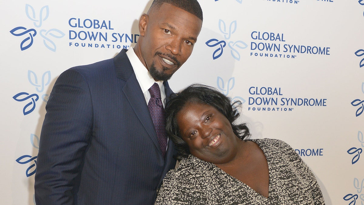 Jamie Foxx wears blue suit with sister DeOndra Dixon at Global Down Syndrome Foundation benefit