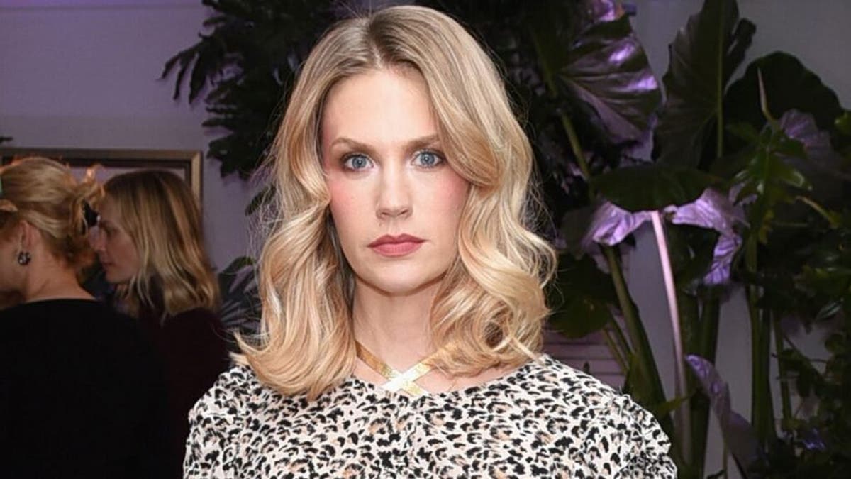 January Jones posed in a pink bra for Breast Cance Awareness Month