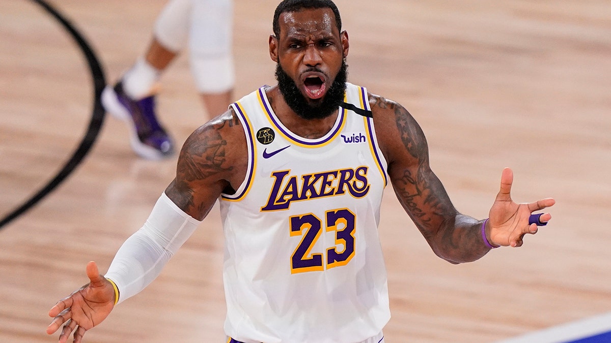 Los Angeles Lakers' LeBron James (23) reacts after no foul was called against the Miami Heat during the second half in Game 3 of basketball's NBA Finals, Sunday, Oct. 4, 2020, in Lake Buena Vista, Fla. (AP Photo/Mark J. Terrill)