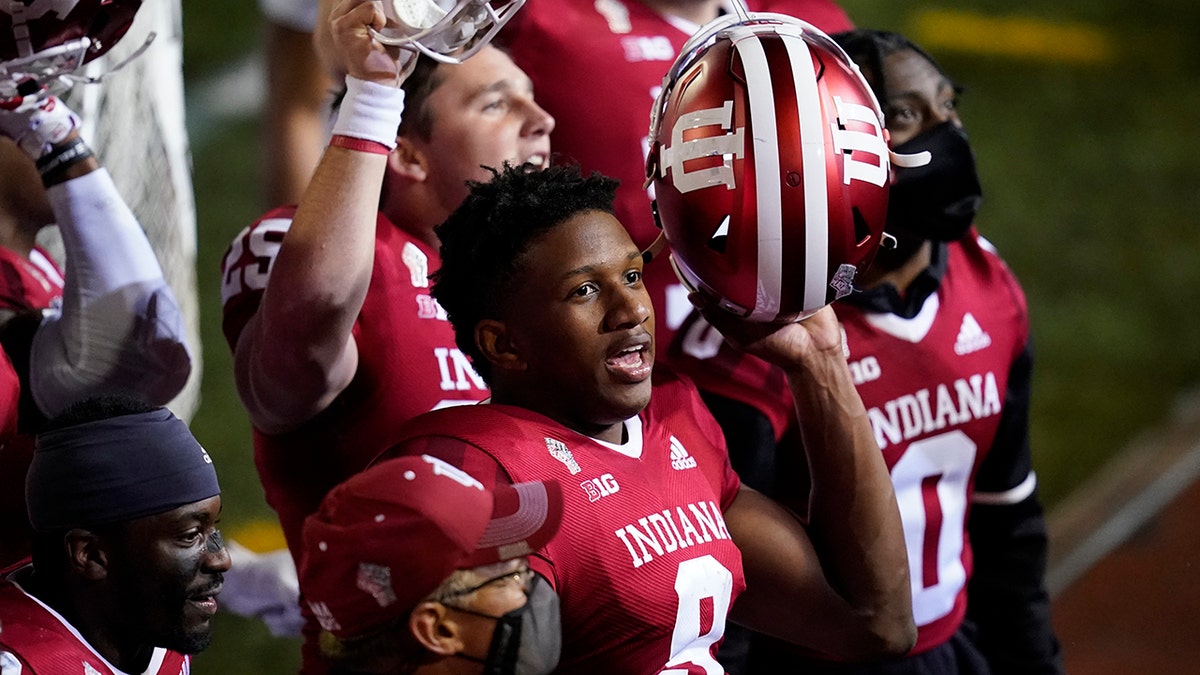 Indiana quarterback Michael Penix Jr. (9) celebrates after Indiana defeated Penn State in overtime of an NCAA college football game, Saturday, Oct. 24, 2020, in Bloomington, Ind. Indiana won 36-35. (AP Photo/Darron Cummings)