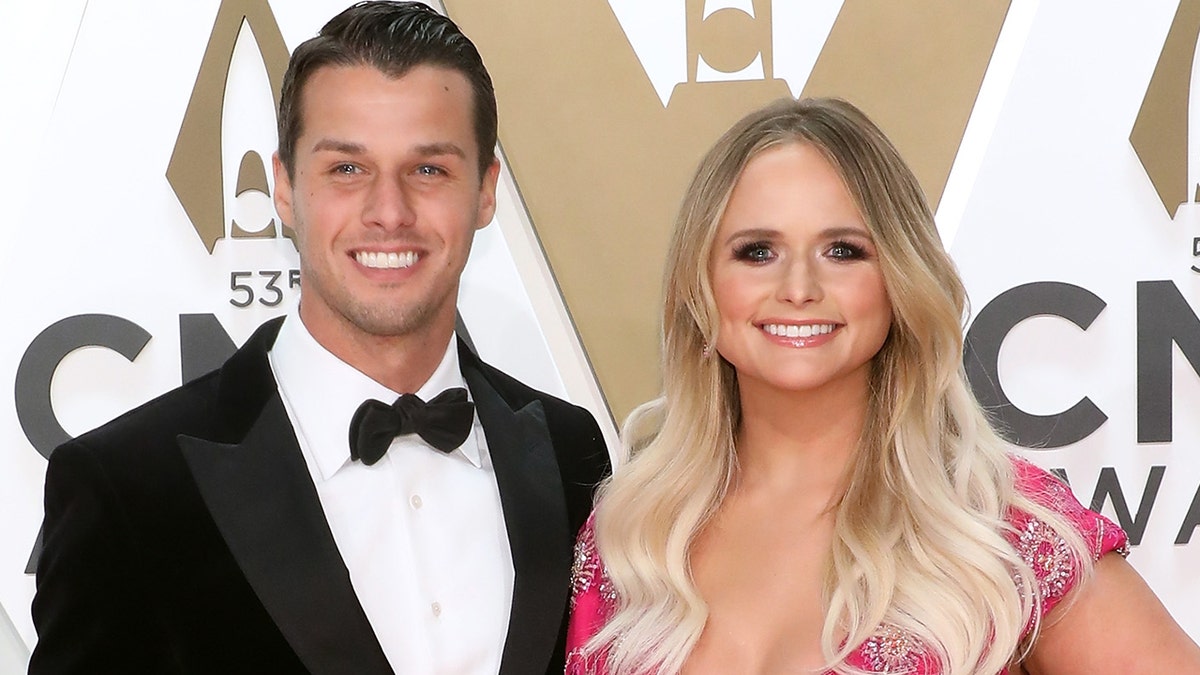 Miranda Lambert (right) and her husband Brendan McLoughlin (left) star in her music video for the song 'Settling Down.' (Photo by Taylor Hill/Getty Images)