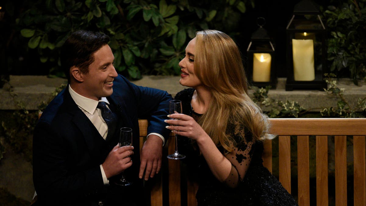 From l-r: Beck Bennett as Ben K and host Adele as herself during 'The Bachelor' sketch.