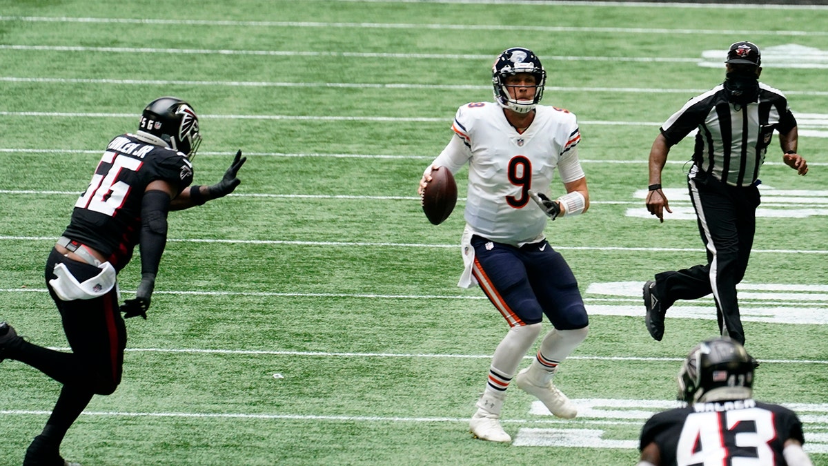 Chicago Bears quarterback Nick Foles (9) works against the Atlanta Falcons during the second half of an NFL football game, Sunday, Sept. 27, 2020, in Atlanta. (AP Photo/Brynn Anderson)