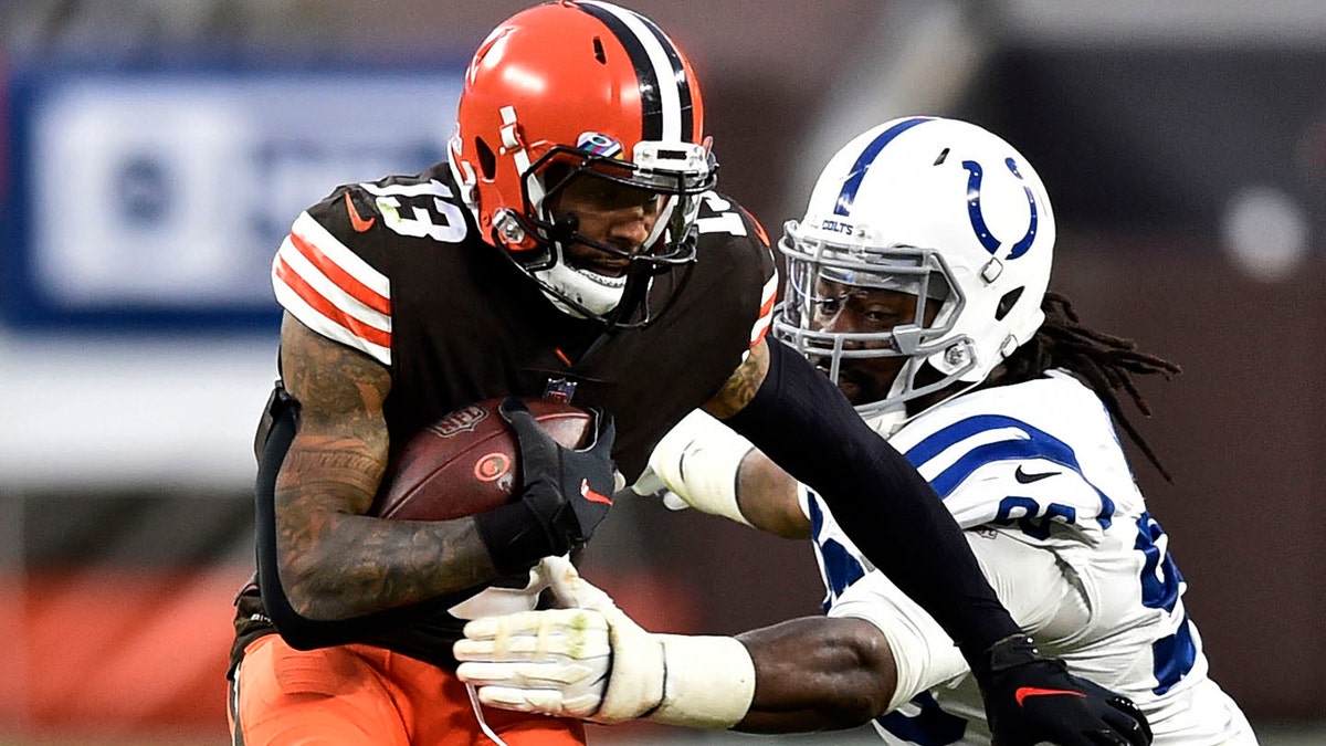 Cleveland Browns wide receiver Odell Beckham Jr. (13) rushes during the second half of an NFL football game against the Indianapolis Colts, Sunday, Oct. 11, 2020, in Cleveland. The Browns won 32-23. (AP Photo/David Richard)