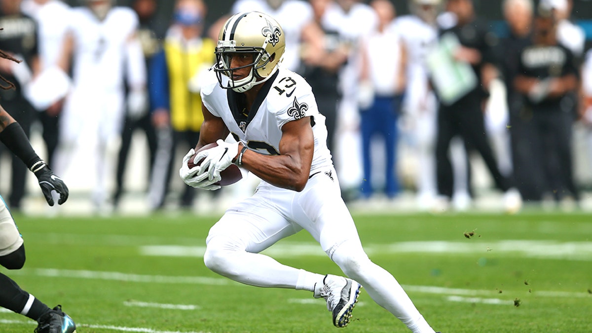 Dec 29, 2019; Charlotte, North Carolina, USA; New Orleans Saints wide receiver Michael Thomas (13) runs after a reception in the first quarter against the Carolina Panthers at Bank of America Stadium.