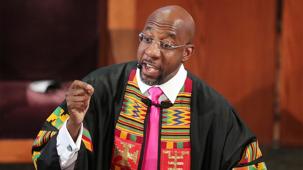 In this June 23, 2020, file photo, Rev. Raphael G. Warnock delivers the eulogy for Rayshard Brooks' funeral at Ebenezer Baptist Church in Atlanta. (Curtis Compton/Atlanta Journal-Constitution via AP, Pool)