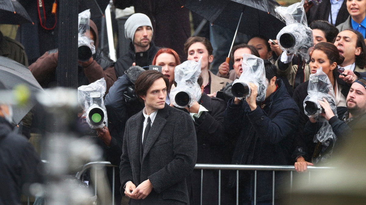Actor Robert Pattinson during filming of 'The Batman' outside St George's Hall in Liverpool, Monday Oct. 12, 2020. (Peter Byrne/PA via AP)