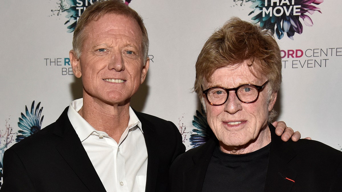 James Redford (left), son of Hollywood legend Robert Redford (right), has died of cancer at 58. (Photo by Tim Mosenfelder/Getty Images)