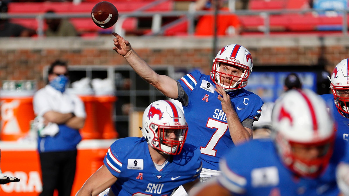 SMU quarterback Shane Buechele (7) throws a pass during the second half of an NCAA college football game against Memphis in Dallas, Saturday, Oct. 3, 2020. (AP Photo/Roger Steinman)