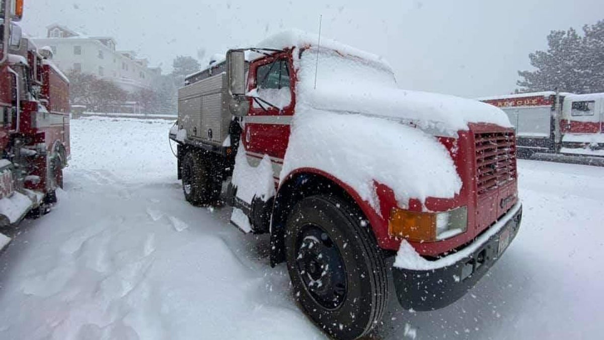 This photo released by the U.S. Forest Service shows significant snowfall near where officials have been battling the Cameron Peak Fire in Colorado.