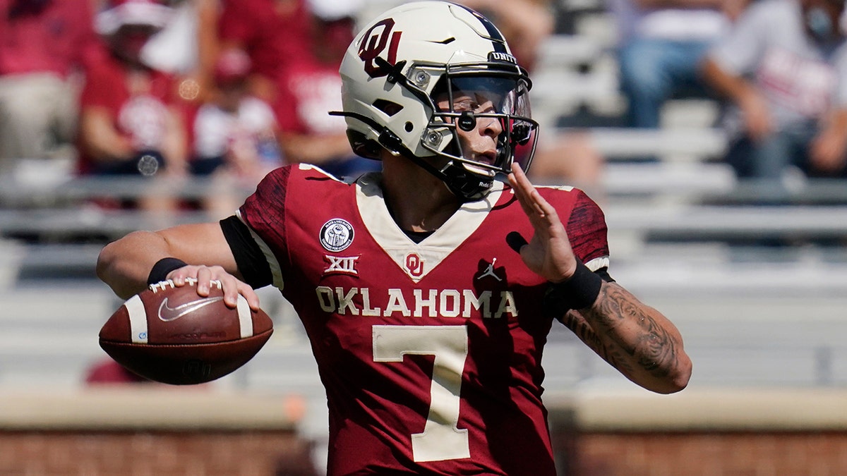 Oklahoma quarterback Spencer Rattler (7) passes in the second half of an NCAA college football game against Kansas State Saturday, Sept. 26, 2020, in Norman, Okla. (AP Photo/Sue Ogrocki).