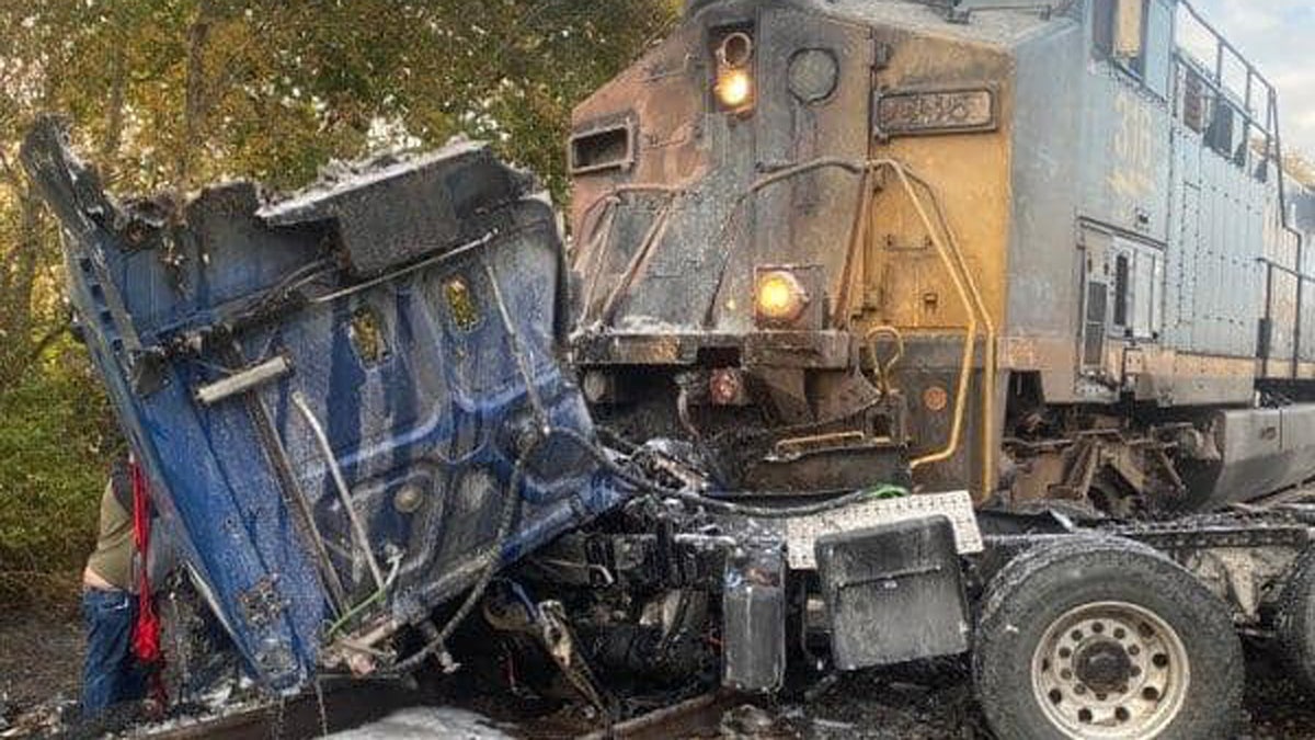 The aftermath after a freight train ran into a semi-truck that was stuck on the tracks in Pendleton, Ind., on October 9, 2020.